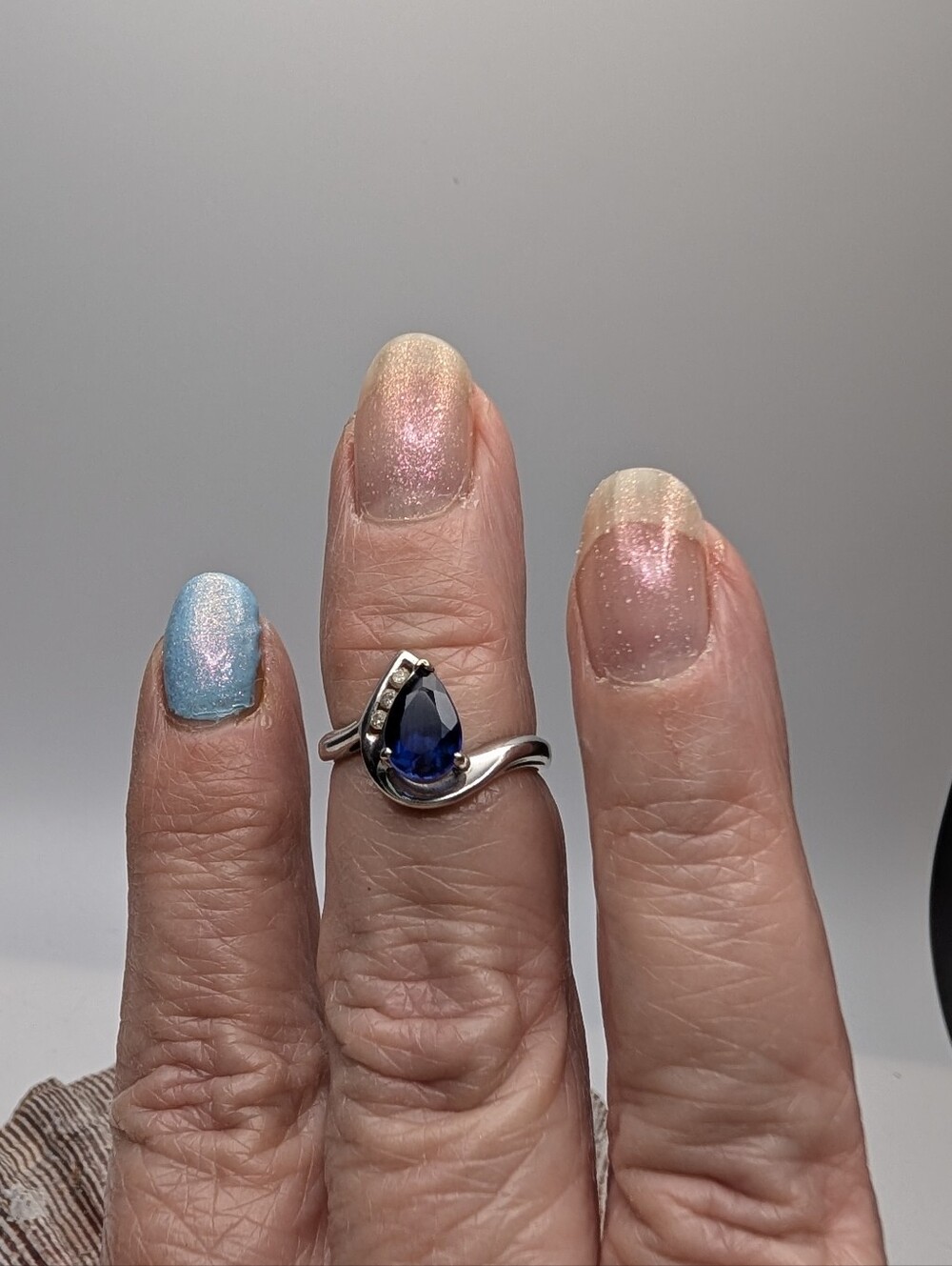 Blue Sapphire Teardrop Gemstone & 3 diamonds Set In 10k white Gold